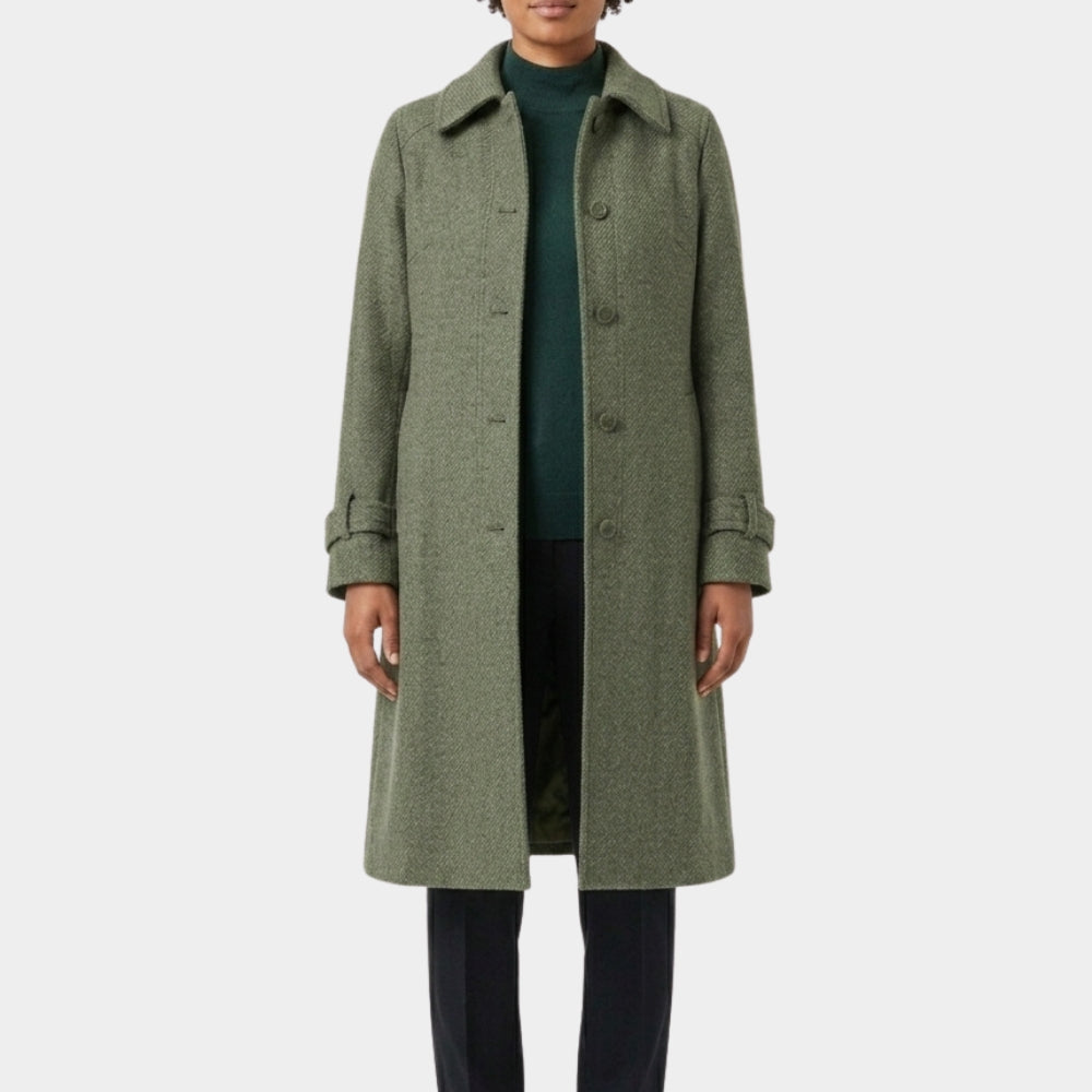 American Hostage Barbara Heckman Green Overcoat