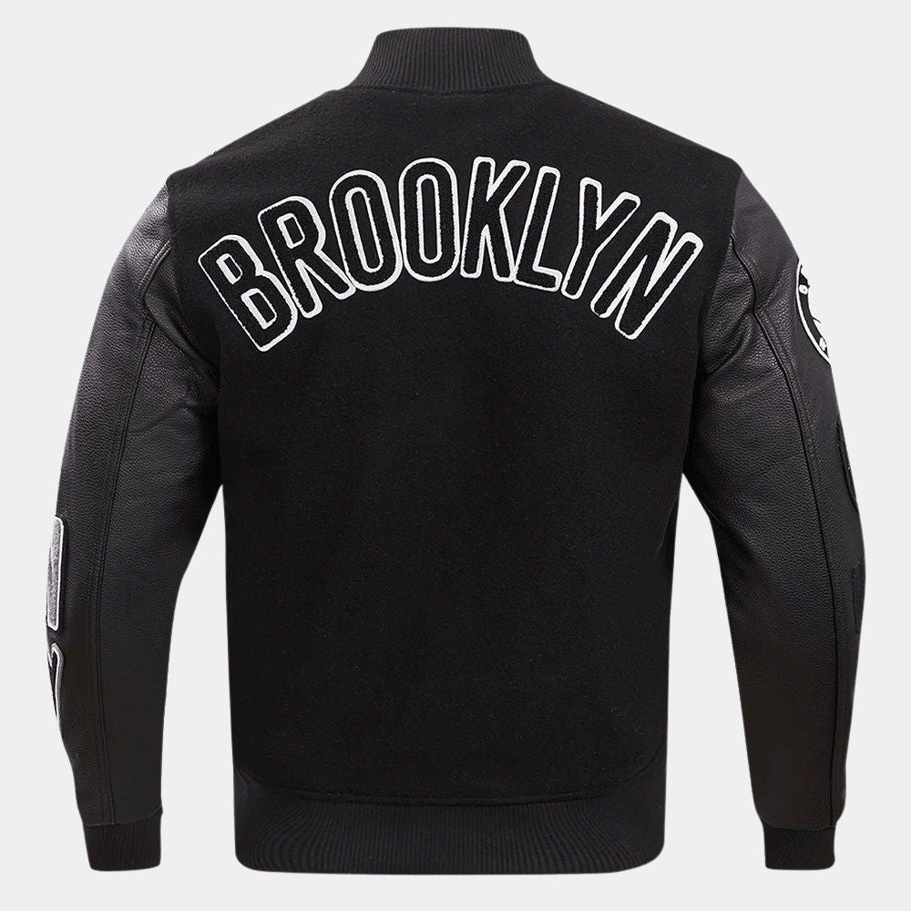 Brooklyn Nets  Basketball Black Varsity Jacket with Leather Sleeves - Mannequin Back View