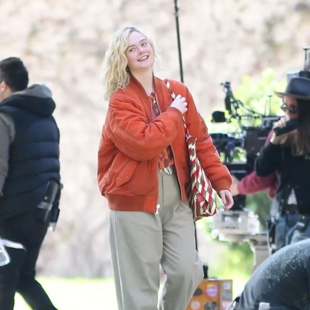 Margo Millet Margo’s Got Money Troubles Elle Fanning Orange Bomber Jacket - Front View