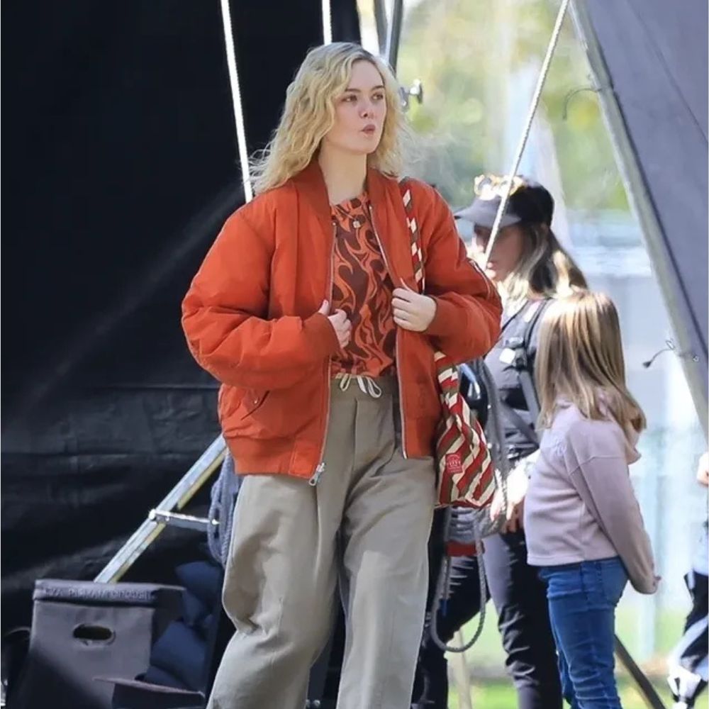 Margo Millet Margo’s Got Money Troubles Elle Fanning Orange Bomber Jacket - Posture Front View