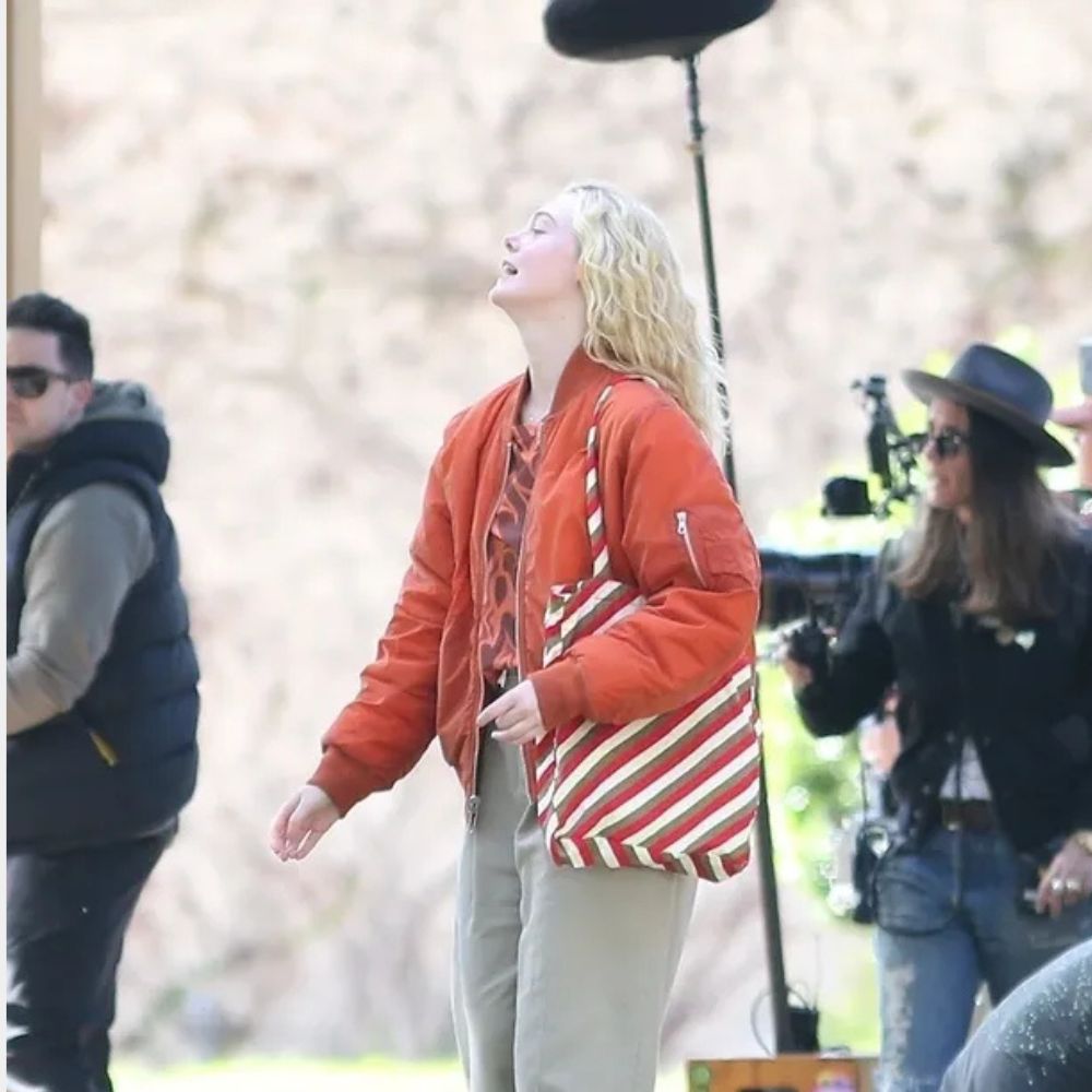 Margo Millet Margo’s Got Money Troubles Elle Fanning Orange Bomber Jacket - Side View