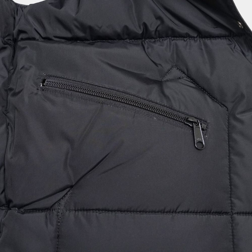 SHERPUFF &nbsp;Black Leather Puffer Vest with Faux Shearling Collar - Mannequin Pocket Close - Up View