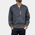 Vincent Vincent's look in Paris Has Fallen rocking that cotton bomber jacket - Front View